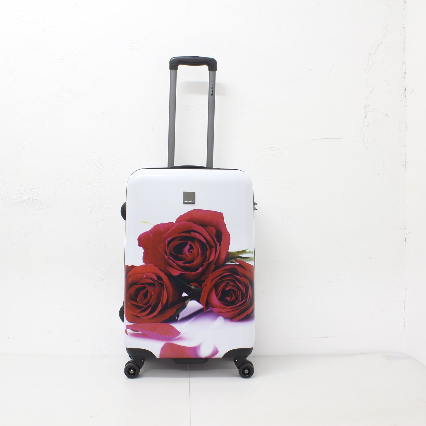 suitcase printed with red roses